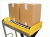 VESTIL CONVEYOR WITH RETRACTABLE STOPS